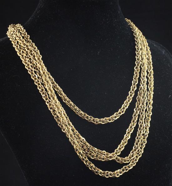 A gold (tested as 18ct) fancy link guard chain, 62in.